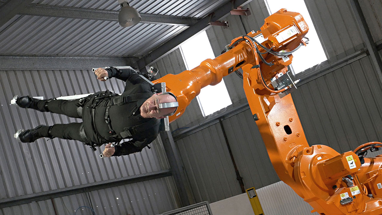 Stelarc performing 'PROPEL: BODY ON ROBOT ARM  and PROPEL: EAR ON ROBOT ARM' 